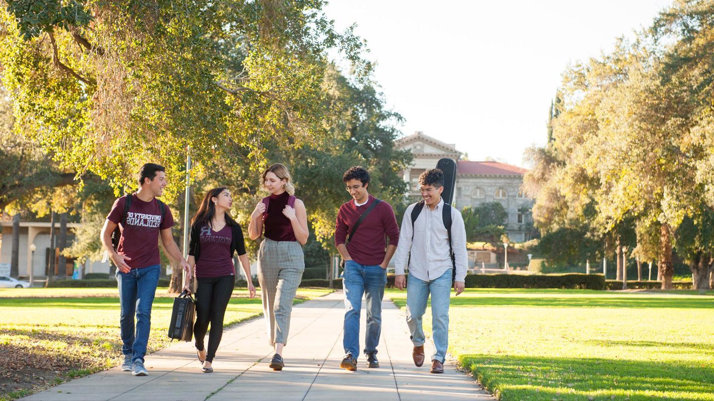 Media masthead - Graduate students walking in Redlands main campus